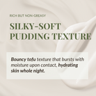 Advertisement featuring text overlay describing a creamy, silky-soft FREEZE THE YOUTH Hydra Firming Cream with age-defying formula that hydrates skin, set against a backdrop of smooth, white cream swirls.