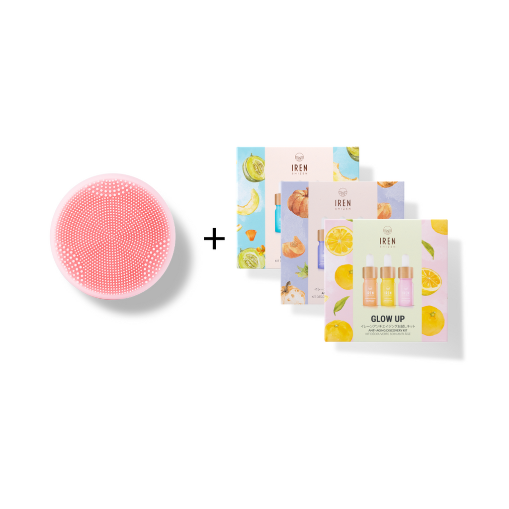 Customize your self-care spa day with a PRO MINI Skin Genie Pro + Discovery Kit face mask and an IREN Shizen pink box adorned with lemons on it.