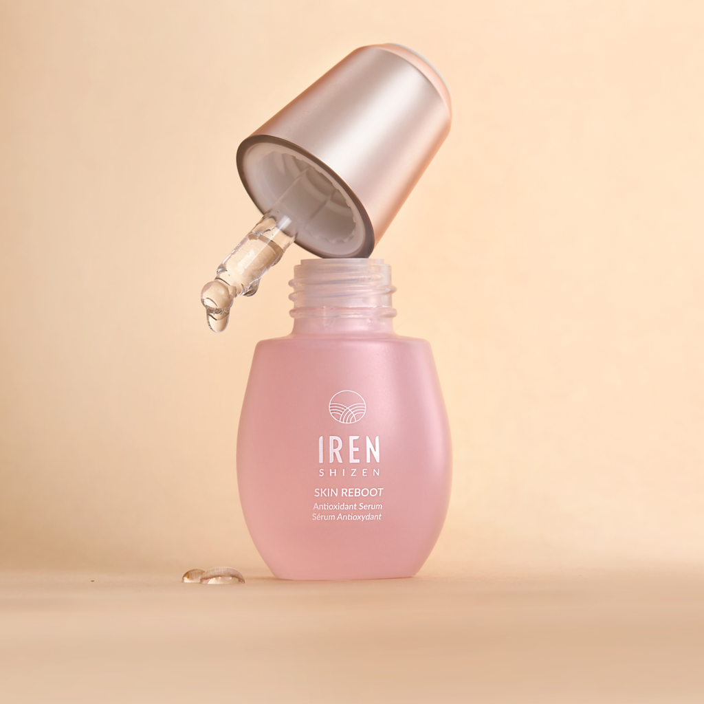A Japanese skincare set by IREN Shizen with a custom pink liquid on top, inspired by the relaxing properties of onsens.